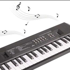 Teclado eléctrico de 37 teclas, instrumento musical de juguete mini portatil